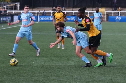 IMG 10022-Enfields-Lyle-Della-Verde-appeals-to-the-assistant-referee-for-a-foul-against-Harrison-Sodje