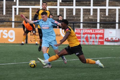 IMG 9886-Marcus-Wyllie-beats-SinnKaye-Christie-before-scoring-Enfields-goal-Marcus-Wyllie-R-celebrates-his-goal