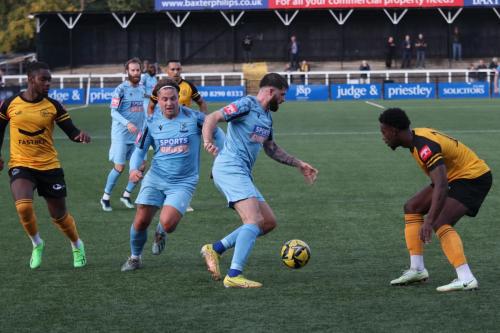 IMG 9933-Enfields-Jake-Cass-runs-at-Sinnkaye-Christie-watched-by-Harrsion-Sodje-L-and-Lewis-Taaffe