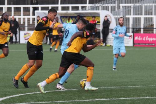 IMG 9996-Enfields-Marcus-Wyllie-tries-to-get-past-Jalen-Jones-L-and-Sinnkaye-Christie