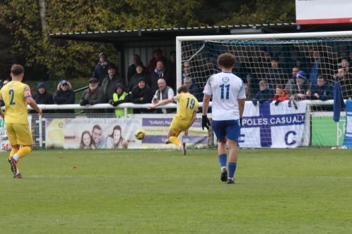 IMG 1955-Stortfords-Harry-Beadle-clears-a-shot-from-Jake-Cass