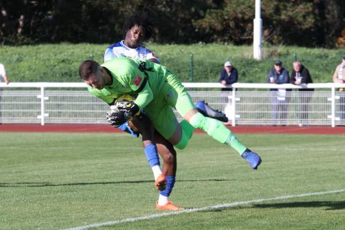 IMG 8930Enfields-Andre-Coker-collides-with-Sam-Beasant