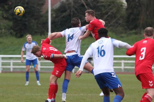 IMG 9452-Enfields-Adam-Cunnington-is-marked-by-Connor-Witherspoon-L-and-Harry-Gibbs