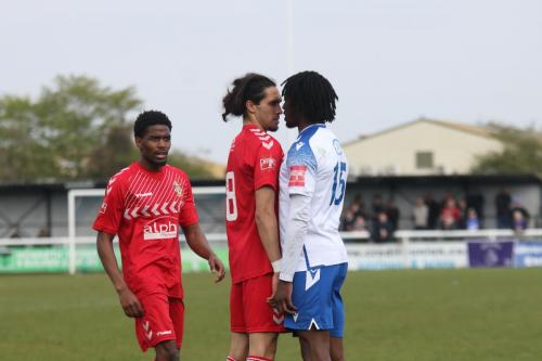 IMG 9619-Jon-Nzengo-moves-in-to-separate-Garrett-Kelly-and-Andre-Coker-who-both-received-yellow-cards