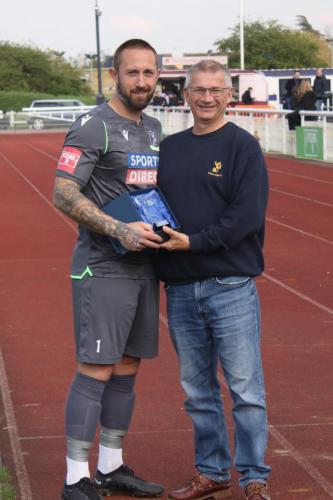 IMG 9701-Nathan-McDonald-receives-the-Supporters-Club-Player-of-the-Year-trophy-from-Paul-Millington