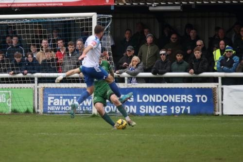 IMG 7797-Shaun-Rowley-clears-past-Jake-Casss-attempted-charge-down