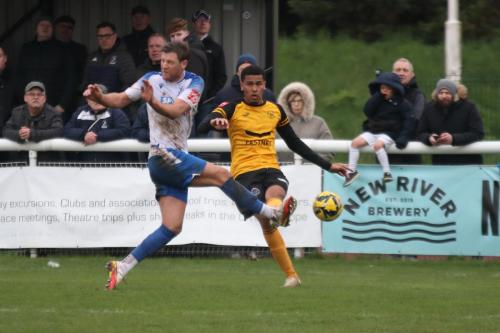 IMG 7997-Adam-Cunnington-L-blocks-a-clearance-from-Jalen-Jones