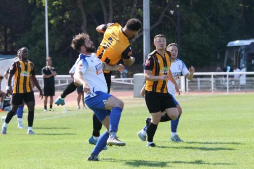 IMG 6571-Folkestones-Nathan-Green-heads-clear-from-Jake-Cass