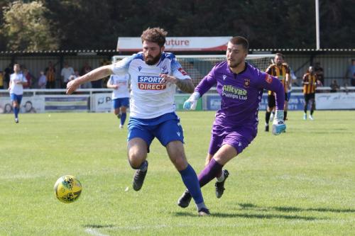 IMG 6633-Jake-Cass-rounds-keeper-Bailey-Vose-before-scoring-Enfields-goal