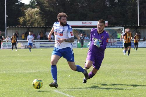 IMG 6634-Jake-Cass-checks-for-covering-defenders-before-shooting-into-the-empty-net