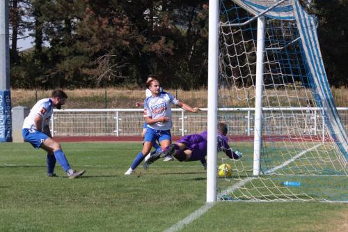 IMG 6680-Folkestone-keeper-Bailey-Vose-dives-at-the-feet-of-Sam-Youngs