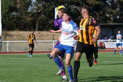 IMG 6788-Folkestones-Bailey-Vose-beats-Marcus-Wyllie-to-a-cross