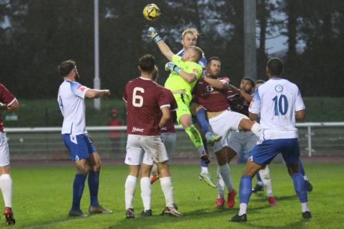 IMG 0760-Hastings-keeper-Louis-Rogers-punches-clear