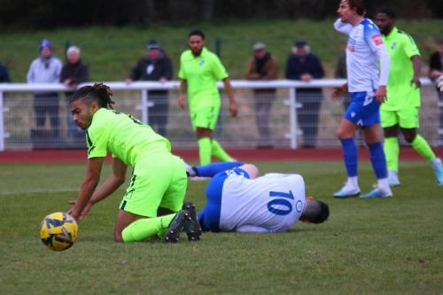 IMG 4050-Marcus-Wyllie-R-comes-off-worse-in-a-collision-with-Camron-Gbadebo