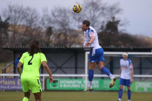 IMG 4138-Adam-Cunnington-heads-the-ball-forwards