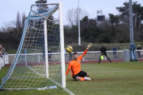 IMG 4299-Wingates-Ben-Goode-is-beaten-by-Lyle-Della-Verdes-deflected-free-kick