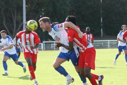 IMG 7076-Enfields-Adam-Cunnington-tussles-with-Ugonna-Emenike