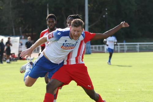 IMG 7079-Enfields-Adam-Cunnington-tussles-with-Ugonna-Emenike