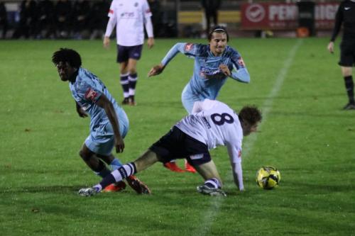 IMG 8515-Casuals-Tyler-Caton-challenged-by-Andre-Coker-L-and-Sam-Youngs