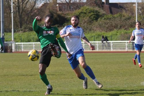 IMG 8692-Rakim-Richards-hooks-the-ball-clear-from-Jake-Cass