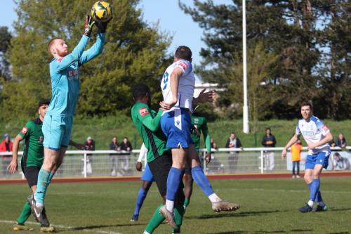 IMG 8765-Haringeys-Max-Ovenden-collects-a-cross