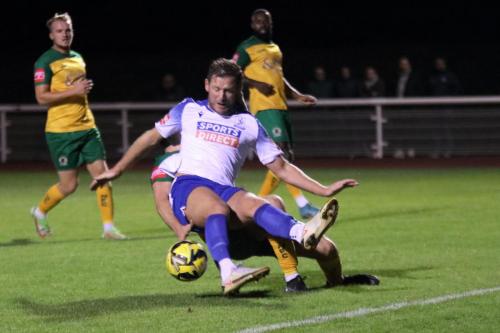 IMG 8308-Enfields-Adam-Cunnington-is-tackled-from-behind-by-Luca-Cocoracchio-but-manages-to-scramble-the-ball-home