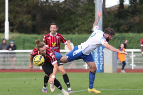 IMG 9531-A-cross-evades-both-Will-Salmon-L-and-Jake-Cass