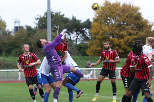 IMG 9628-Lewes-keeper-Lewis-Carey-punches-clear-under-heavy-pressure-