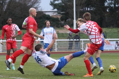 IMG 3616-Enfields-Adam-Cunnington-stretches-for-the-ball-between-Arthur-Lee-and-Ollie-Cook-5