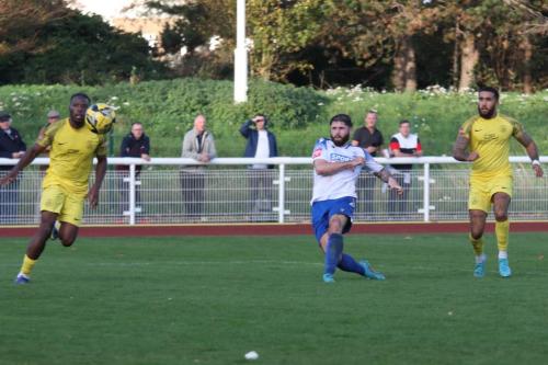 IMG 0429-Jake-Cass-shoots-forcing-a-good-save-from-keeper-Josh-Strizovic