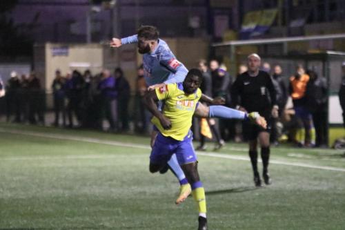 IMG 1213-Jake-Cass-wins-a-header-against-Samuel-Owusu
