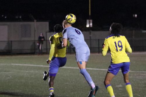 IMG 1224-Olu-Durojaiye-L-and-James-Richmond-challenge-for-a-header-watched-by-Chaynie-Fage-Burgin