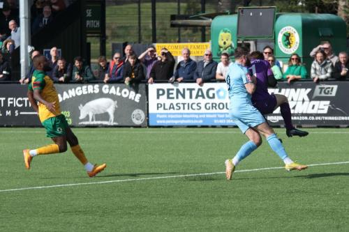 IMG 8270-Horsham-keeper-Taylor-Seymour-collects-the-ball-ahead-of-Jake-Cass