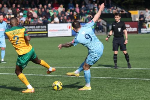 IMG 8350-Chris-Sessegnon-tries-to-block-a-shot-from-Jake-Cass