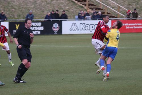 IMG 6177-Tyrique-Hyde-and-Scott-Thomas-R-collide-as-the-referee-avoids-the-ball-referee