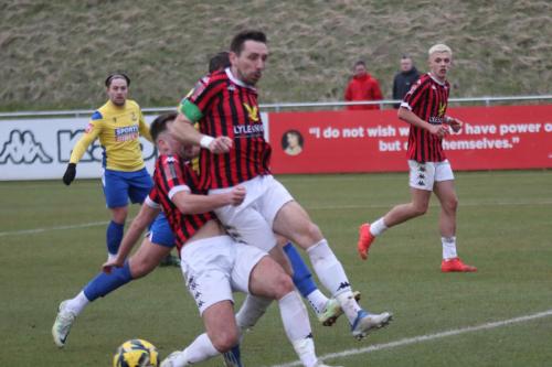 IMG 6285-Alfie-Young-L-and-Tom-Champion-combine-to-cut-out-a-cross