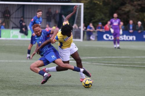 IMG 8014-Andre-Coker-R-escapes-a-challenge-from-Peter-Ojemen-at-the-star-of-a-run-that-ended-with-a-shot-fractionally-over-the-bar