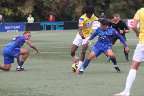 IMG 8019-Having-beaten-Peter-Ojemen-L-Andre-Coker-drgs-the-ball-past-Harrison-Hatfull