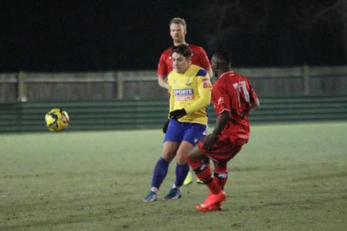 IMG 3856-Lewis-Taaffe-passes-to-the-right-wing-challenged-by-Parris-Mason