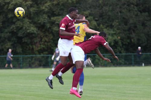 IMG 7260-Adam-Cunnington-flicks-the-ball-on-despite-the-attention-of-Ethan-Kaiser-L-and-Mo-Kamara