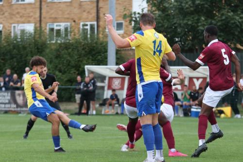 IMG 7291-Lyle-Della-Verde-tries-to-thread-a-shot-through-the-defence