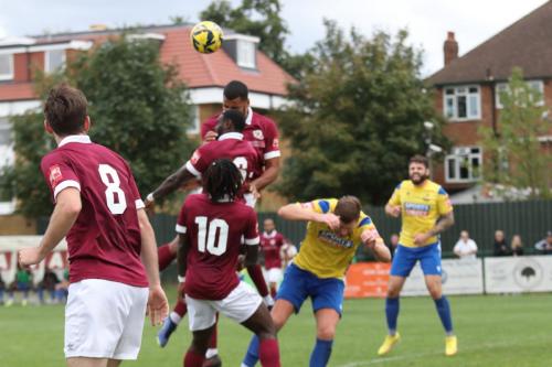 IMG 7308-Enfields-Adam-Cunnington-receives-a-blow-to-head-while-challenging-at-a-corner