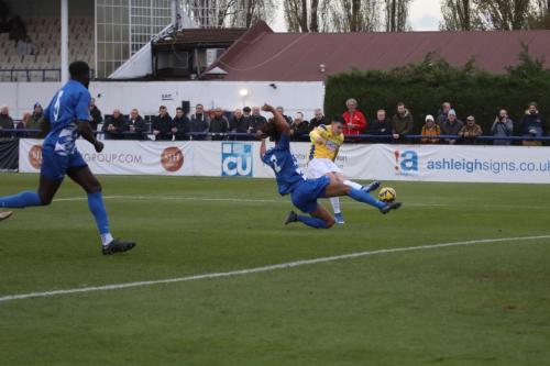IMG 1421-Cameron-Gbadebo-2-tries-to-block-Marcus-Wyllies-cross-which-loops-to-the-far-post-for-Lewis-Knight-to-score