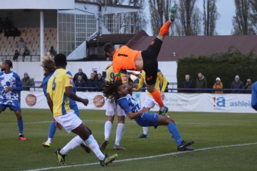 IMG 1483-Wingates-Ben-Goode-collides-with-his-tammate-Cameron-Gbadebo-after-punching-clear