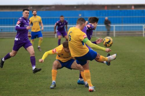 IMG 8012-Rob-Girdlestone-clears-from-Lewis-Taaffe-and-team-mate-Louis-Arrowsmith