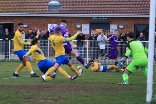 IMG 8149-Jamie-Salmon-2nd-L-puts-Joe-Paynes-cross-out-of-play-for-a-corner-kick