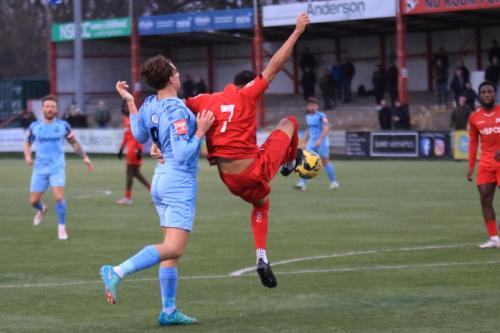 IMG 8561-Danny-Bassett-clears-under-pressure-from-Sam-Youngs