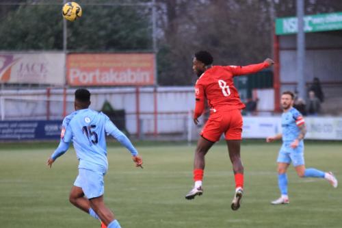 IMG 8571-Kwaku-Frimpong-clears-from-Reece-Beckles-Richards