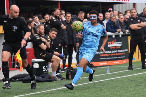 IMG 2937-The-assistant-referee-keeps-a-close-watch-to-see-whether-Dylan-Adjei-Hersey-can-keep-the-ball-in-play.-He-couldnt