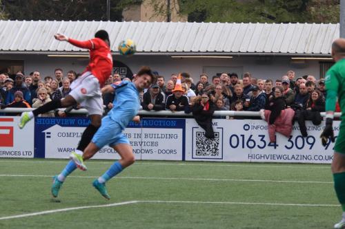 IMG 2993-Enfields-Sam-Youngs-wins-a-header-against-Miquel-Scarlett-but-cant-hit-the-target